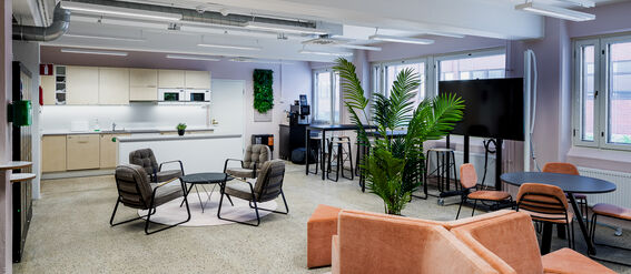 Open area and kitchen in A Grid's coworking space