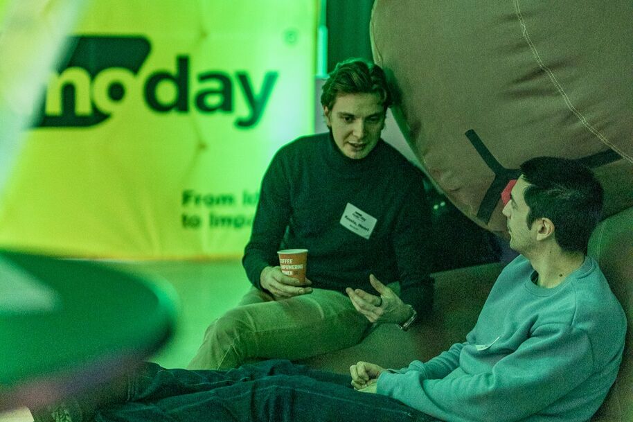 Attendees networking at Demo Day 2025